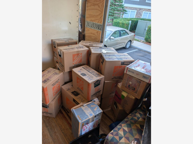Moving boxes packed for transportation